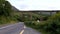 Truck driving past Gleensk Railway Viaduct in Ireland