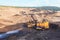 Truck and Electric Shovel in Open Pit North of THAILAND