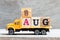 Truck hold block in word 8aug on wood background Concept for date 8 month August