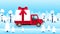 Truck with large gift box drives through the winter forest during snowfall