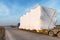 Truck with large oversized cargo on rural road