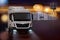 Truck with the lights on at night, against the backdrop of beautiful glare. Freight transport and delivery. Logistics and