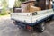 Truck loaded with empty rubbish bins