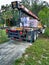  Truck loaded with roofing supplies backing up