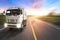 Truck on motorway in beautiful sunset light