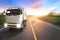 Truck on motorway in beautiful sunset light