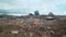 Truck moving rubbish on a landfill dump