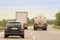 A truck in overtaking on a two-lane highway as a road obstacle