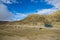 A truck parked on an offroad of Lho La Pass on the way to Lho Manthang