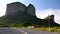 Truck passing in front of Morro do Pai Inacio Canyon, Brazil.