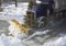 Truck Plowing Snow on Street