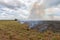 Truck putting fire down on crop field