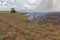 Truck putting fire down on crop field