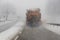 Truck removes snow from road