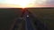 Truck on rural road at sunset