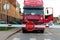 Truck standing at the barrier with a STOP sign.