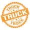 TRUCK text on orange round stamp sign