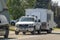 A truck towing a RV trailer motorhome camper during summer