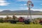 Truck and windmill at Posada Estancia Rio Verde, Riesco, Island,, Chile