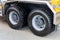 Trucking concept. Rear wheels of a clean truck with Bridgestone L355 tires. New tubeless truck tires on a stamped steel