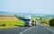 Trucks in the asphalt road in Poland