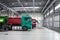 Trucks being repaired in a larger garage. Service maintenance of trucks and cars, diagnostics, car service