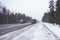 Trucks on the highway in dirty weather, Dangerous driving conditions in winter in cloudy weather.