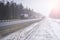 Trucks on the highway in dirty weather, Dangerous driving conditions in winter in cloudy weather.