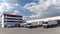 Trucks loading at a depot of a forwarding agency - Transport and logistics in goods trade