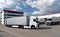 Trucks loading at a depot of a forwarding agency - Transport and logistics in goods trade