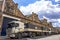 Trucks parked in front of old warehouses