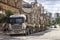 Trucks parked in front of old warehouses