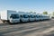 Trucks stand in the parking lot in a row