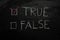 True or False on black chalkboard