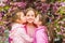 True friendship. Pink our favorite. Children spring garden. Sakura garden. Sisters friends sakura trees background. Kids