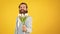 true gentleman with bouquet. love date concept. bearded man in formalwear with tulip flowers. elegant businessman wear