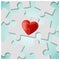 True love concept with pieces of red heart puzzle join together