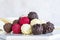 Truffle chocolate assortment on a white background. homemade chocolate pralines