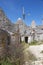 Trulli along the street at Alberobello, Apulia, Italy