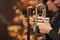 Trumpet with other trumpets out of focus behind