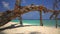 The trunk of the old wood on a sandy deserted beach.