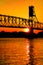 Truss Bridge with Lift Span over River at Sunset