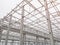 Truss ceiling and metal pillars and girders. Support constructions