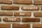 Trust and integrity symbol. Concept words Trust and integrity on red bricks on a beautiful brick wall background. Business and