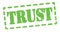 TRUST text written on green stamp sign