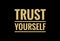 Trust yourself written in bold yellow text isolated on black background. Inspirational, motivational quotes.