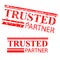 Trusted Partner, 2 style streak red rubber stamp, isolated on white