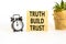 Truth builds trust symbol. Concept words Truth builds trust on wooden blocks on beautiful white table white background. Black