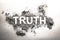 Truth word written in ash, dust, dirt or filth as a cynical concept of lie or post truth in society, politics