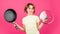 Try this. girl with curlers in hair. Fashion home shot. Pin-up style. Girl Holding Frying Pan. Little homemaker holding